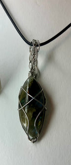 Wire wrapped stones and crystals with stainless steel wire