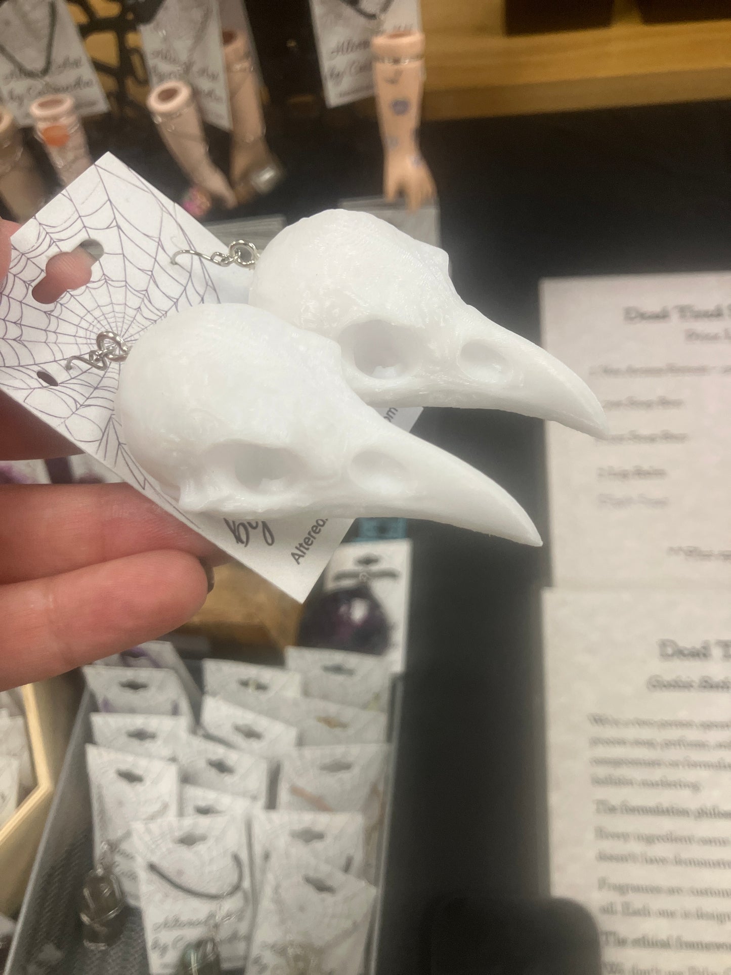 Faux bird skull earrings