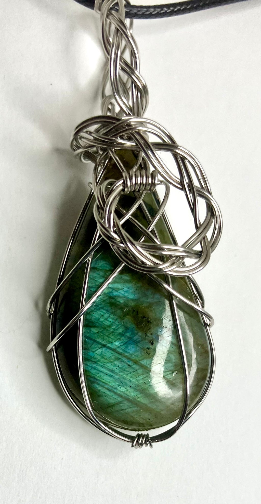 Wire wrapped stones and crystals with stainless steel wire