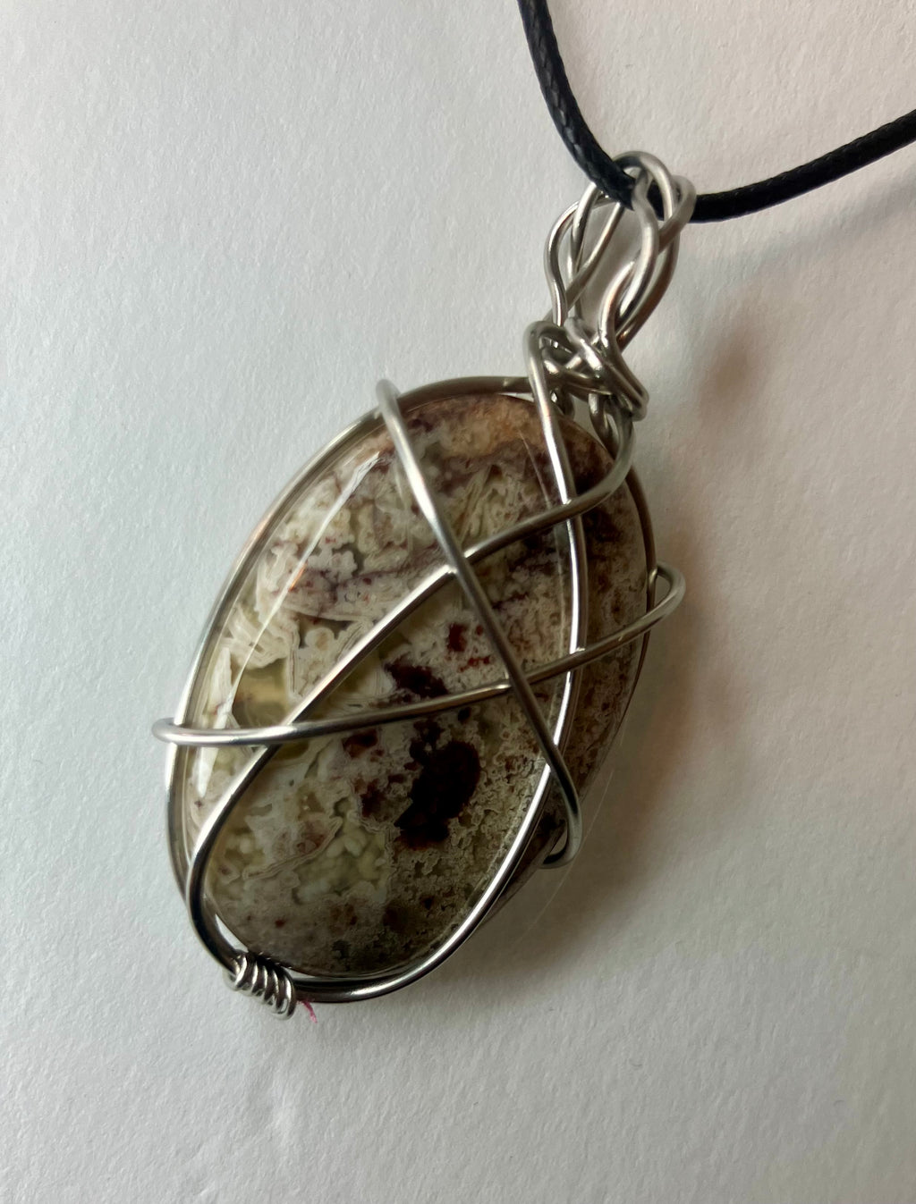 Wire wrapped stones and crystals with stainless steel wire