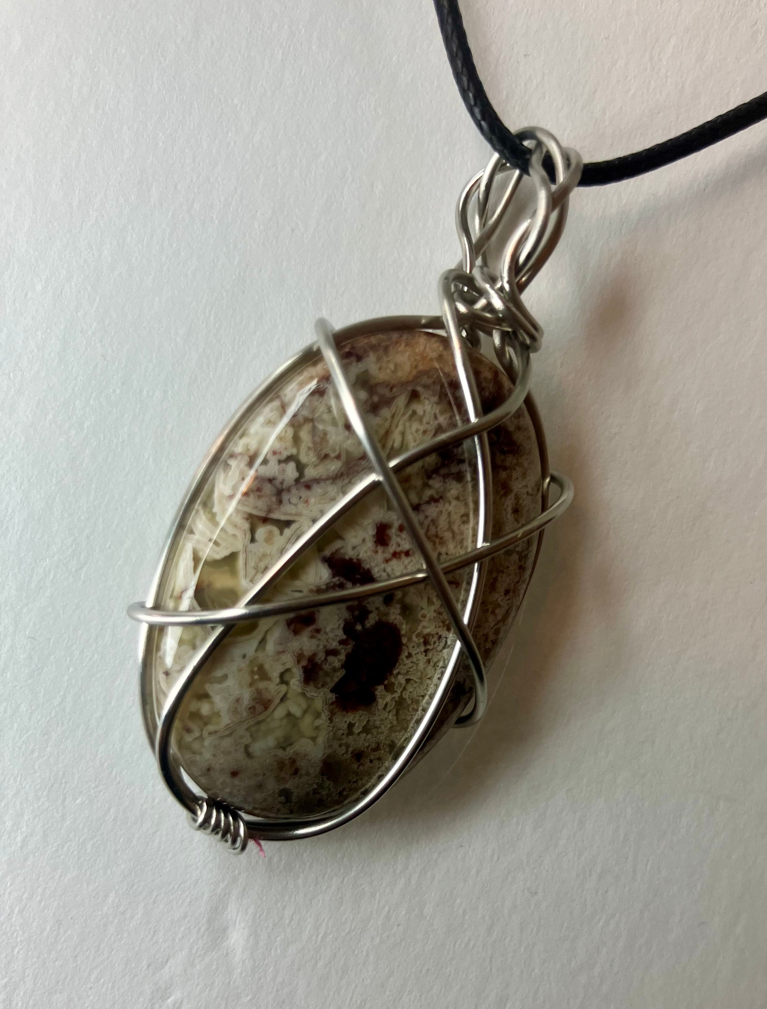 Wire wrapped stones and crystals with stainless steel wire