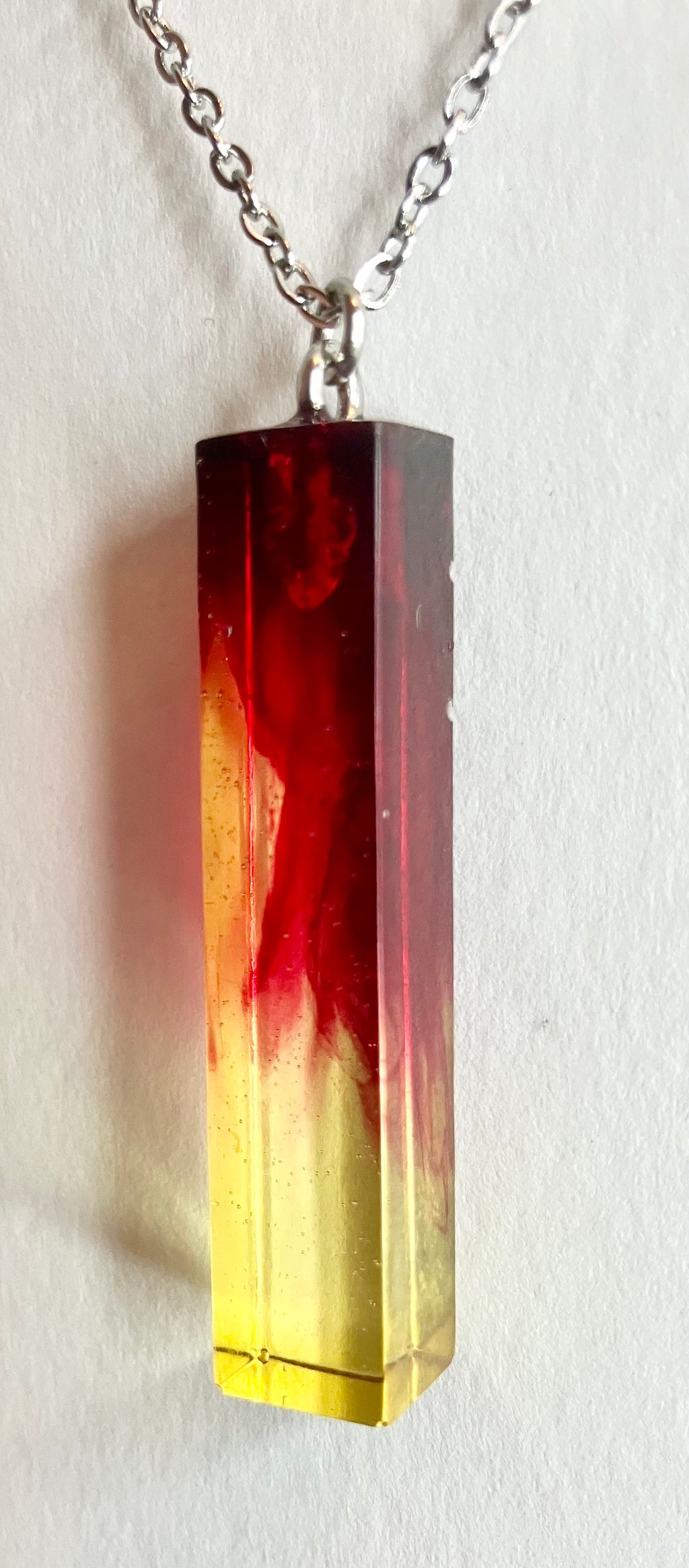 Resin cylinder pendant necklace