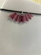 Bat necklaces