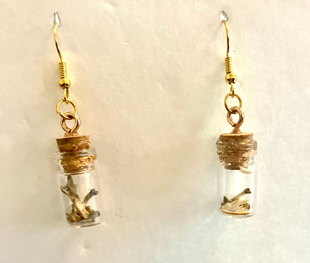 Tiny bone filled vial earrings