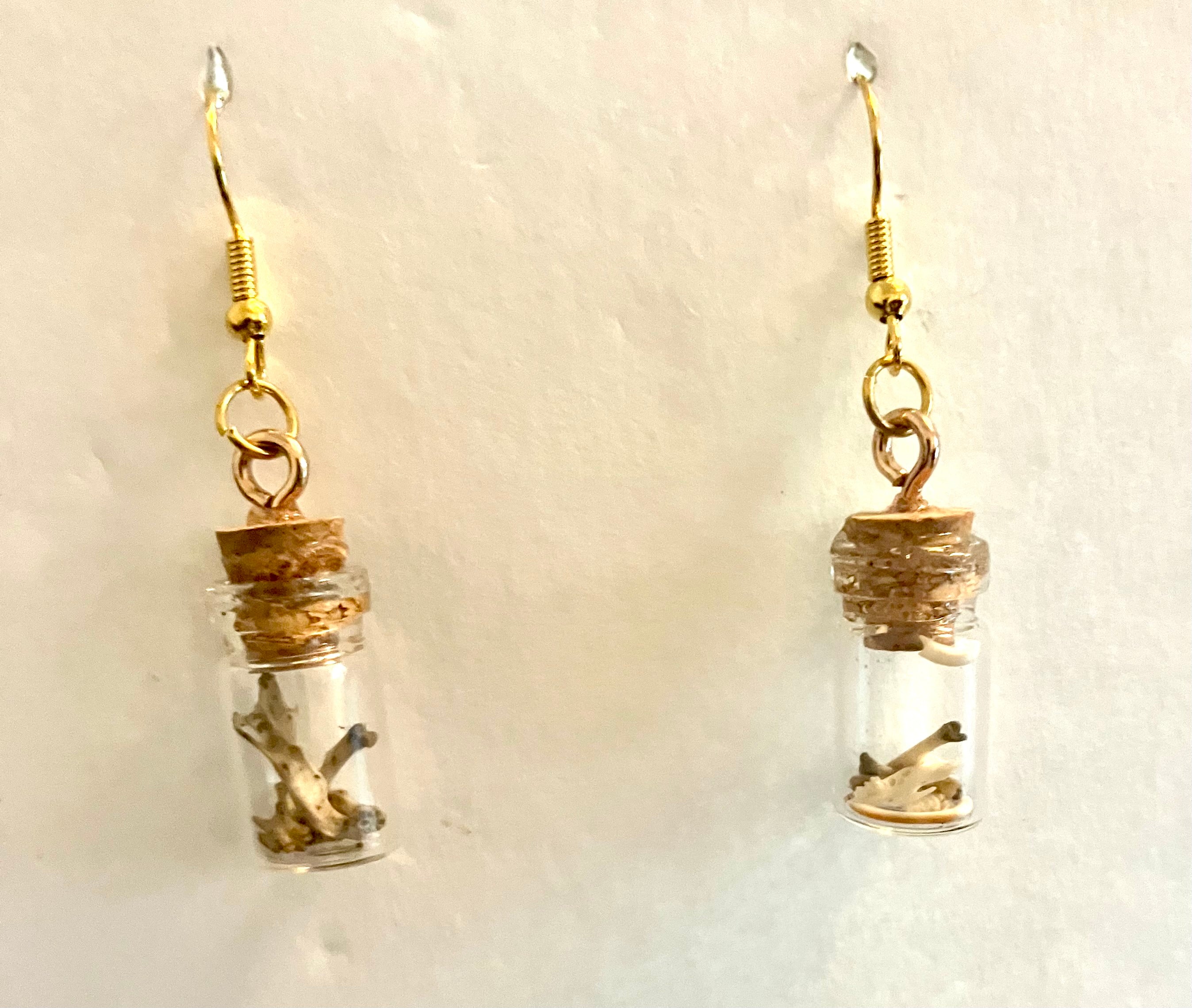 Tiny bone filled vial earrings
