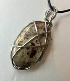 Wire wrapped stones and crystals with stainless steel wire