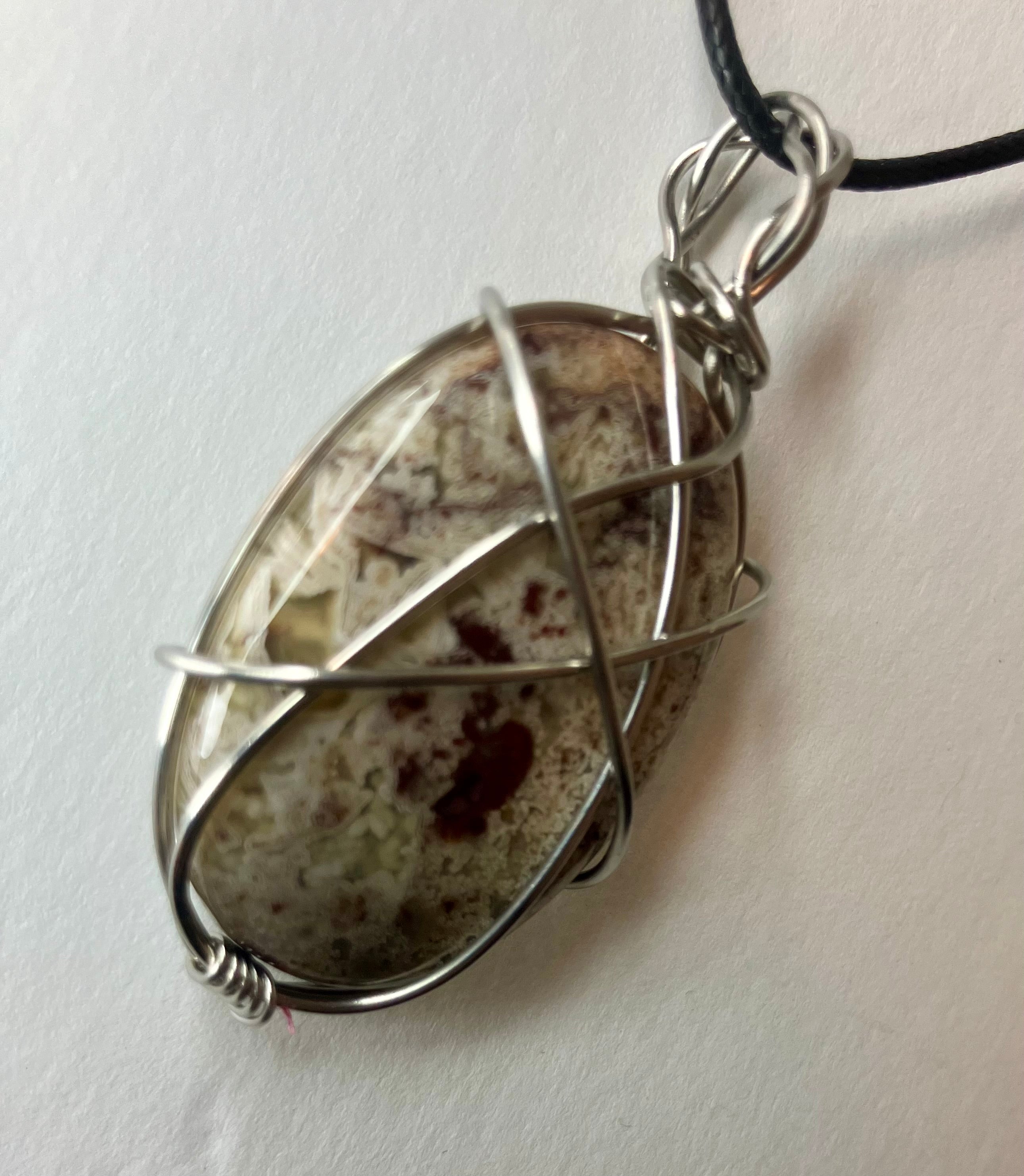 Wire wrapped stones and crystals with stainless steel wire