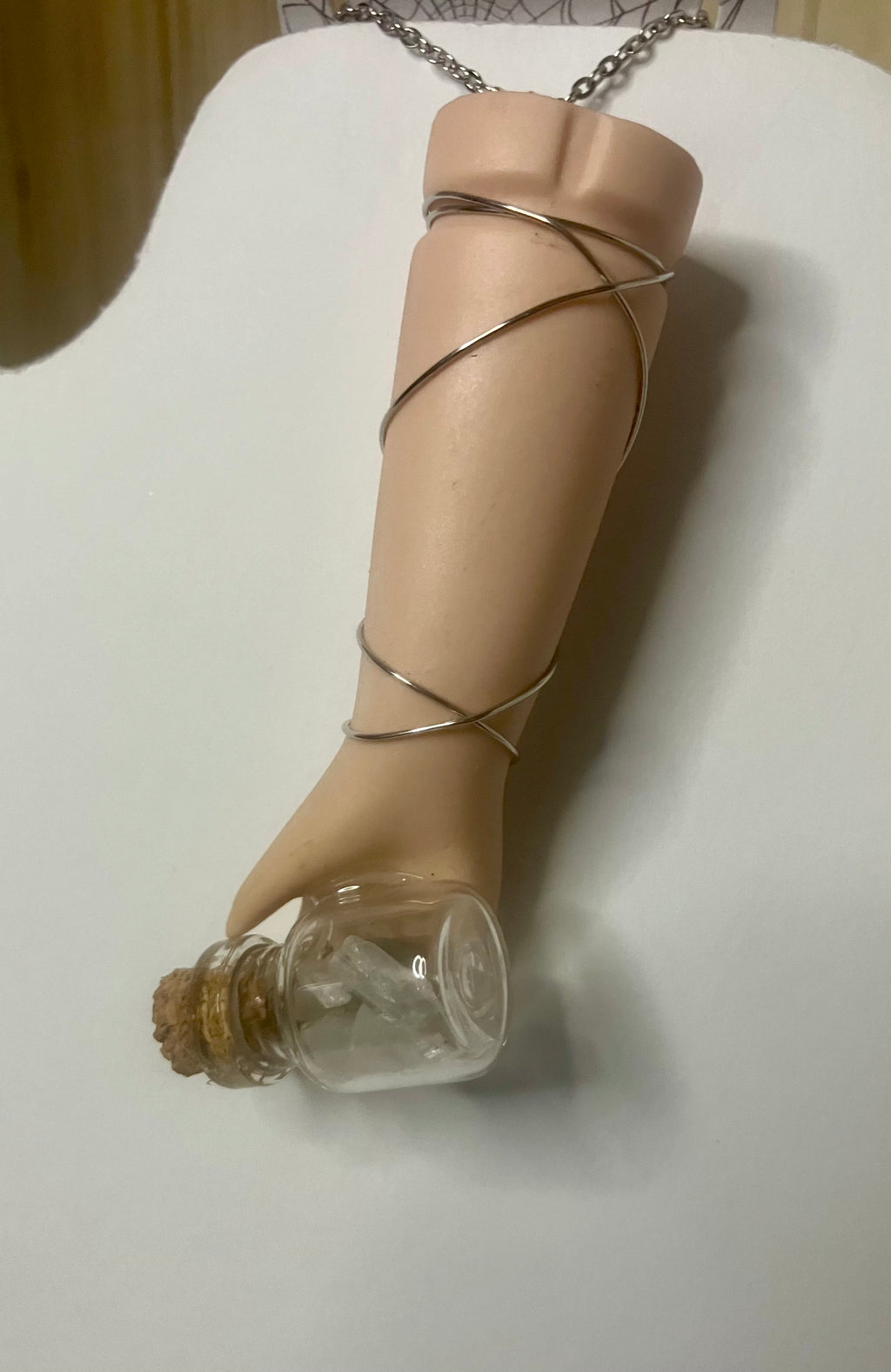 Baby arm necklaces