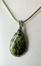 Wire wrapped stones and crystals with stainless steel wire