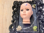 Light up broken doll
