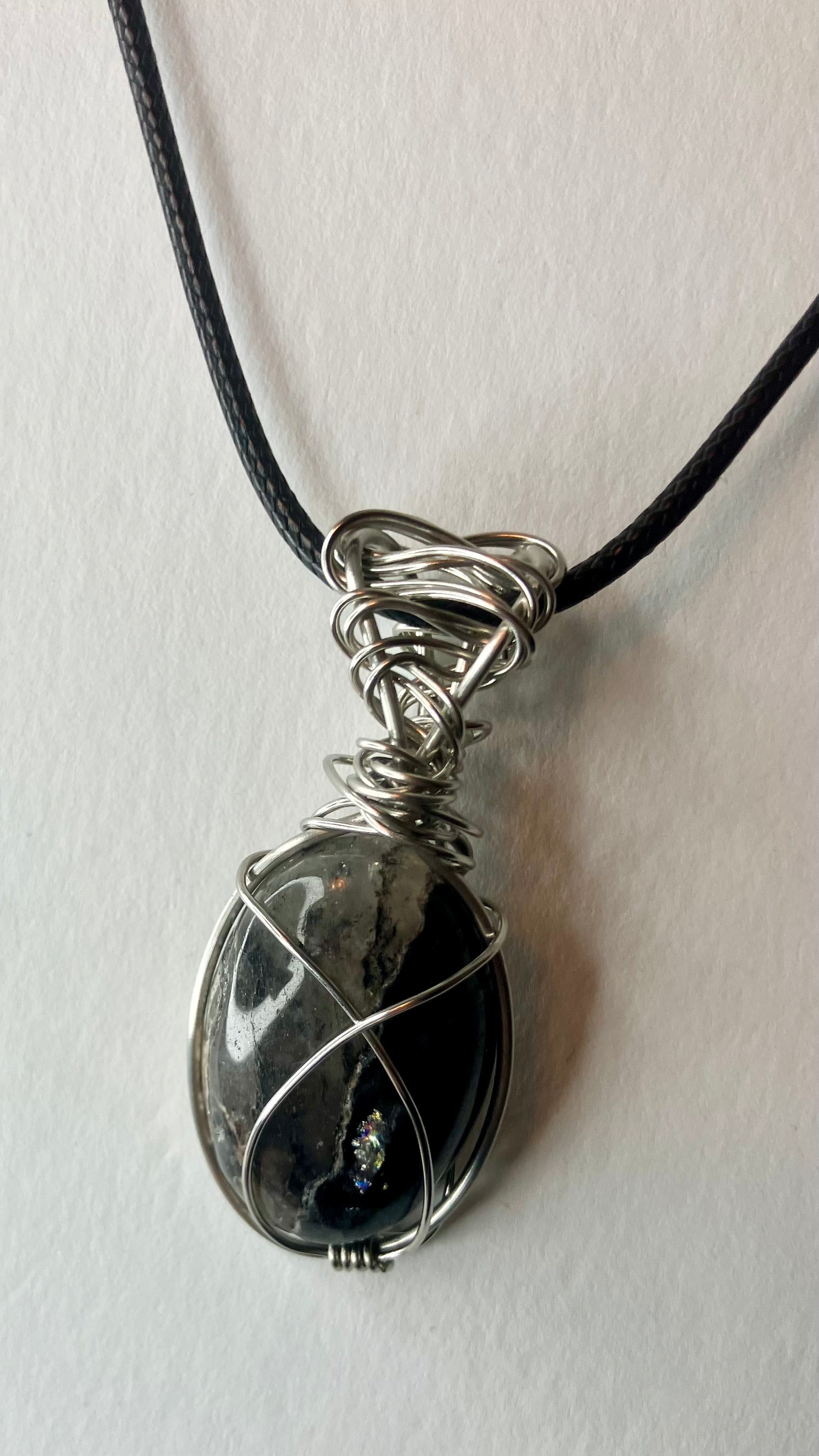 Wire wrapped stones and crystals with stainless steel wire