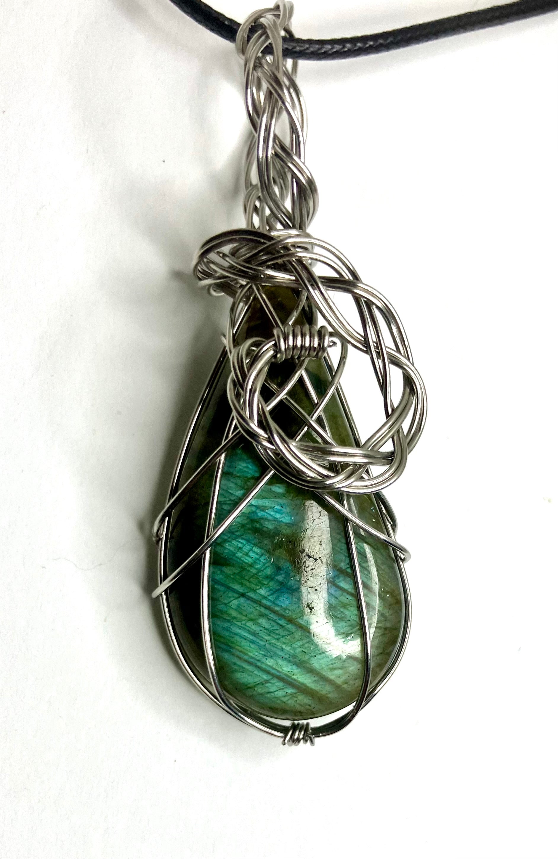 Wire wrapped stones and crystals with stainless steel wire