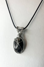 Wire wrapped stones and crystals with stainless steel wire