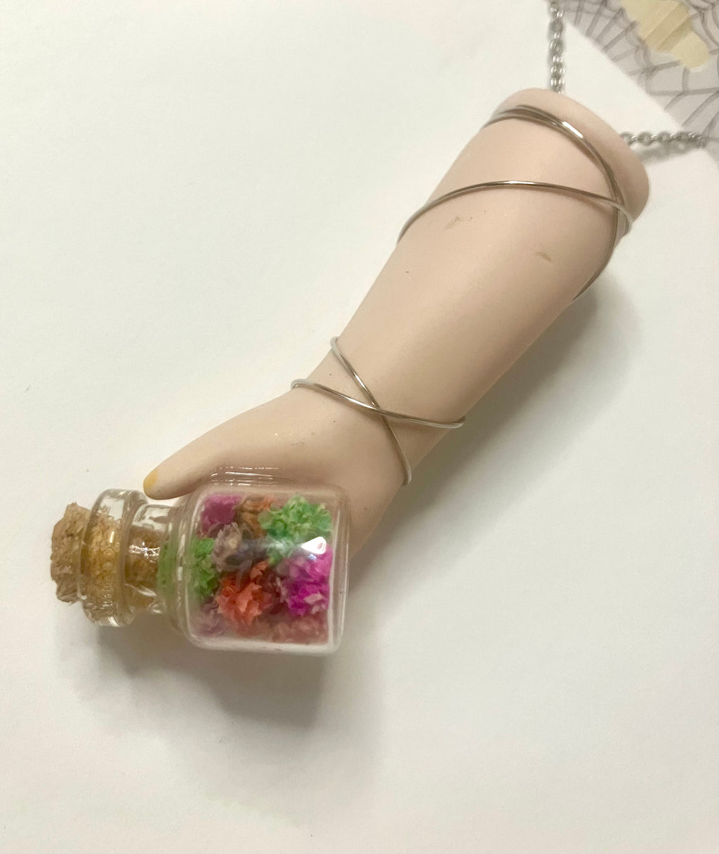 Baby arm necklaces