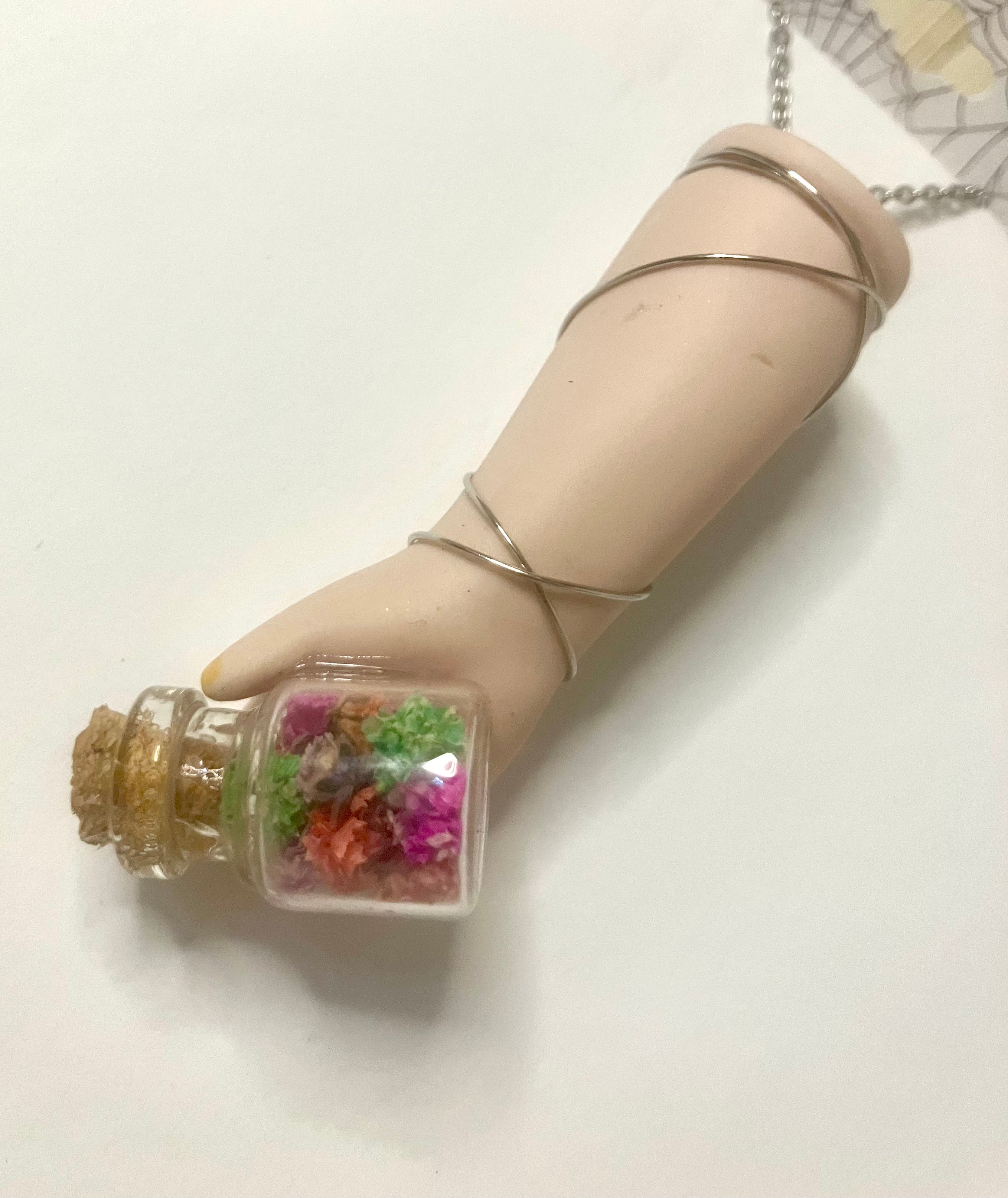 Baby arm necklaces