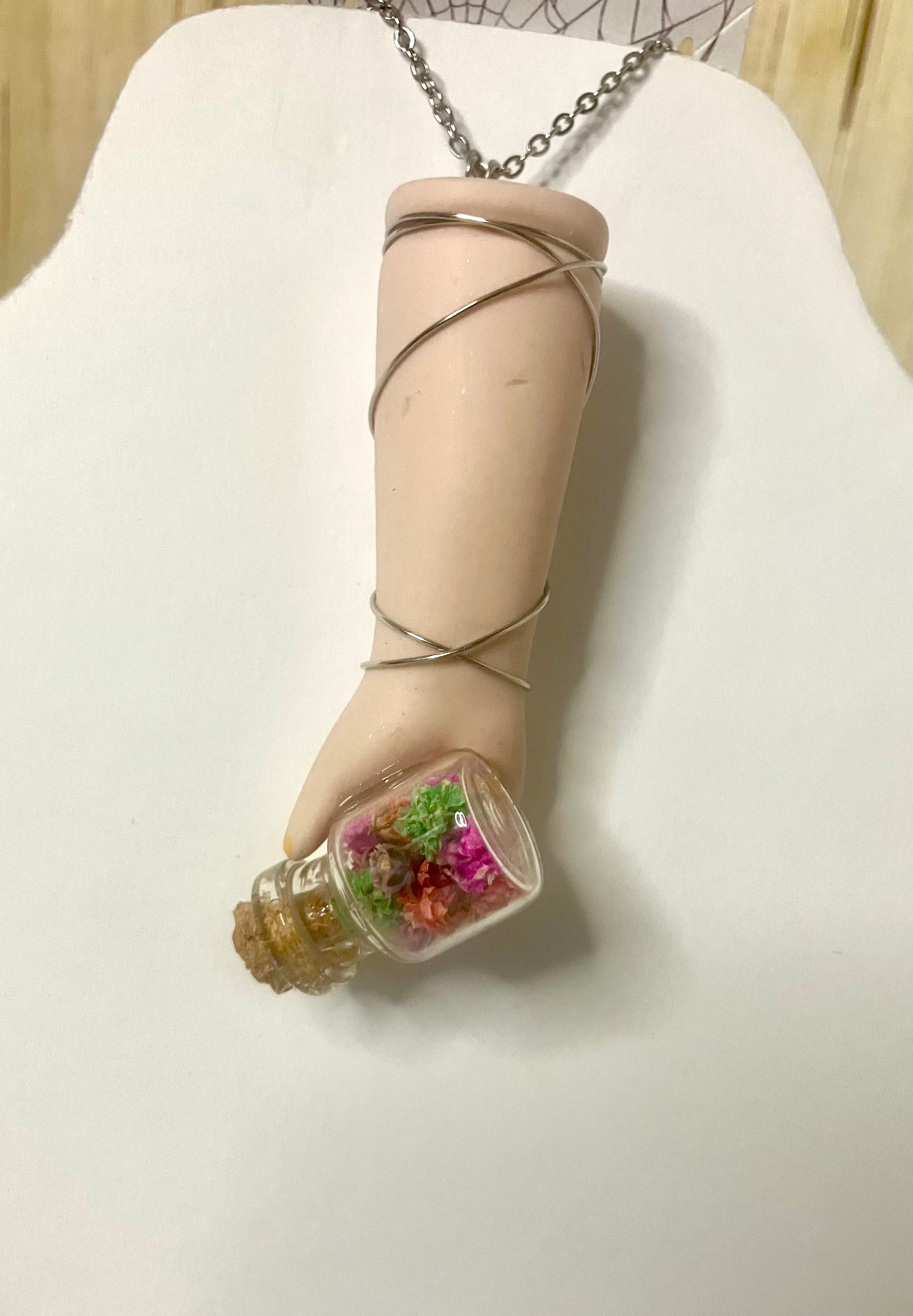 Baby arm necklaces