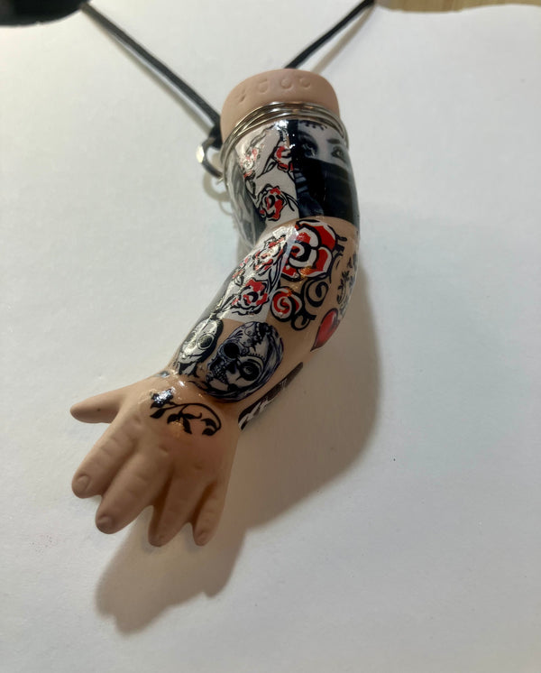 Baby arm necklaces