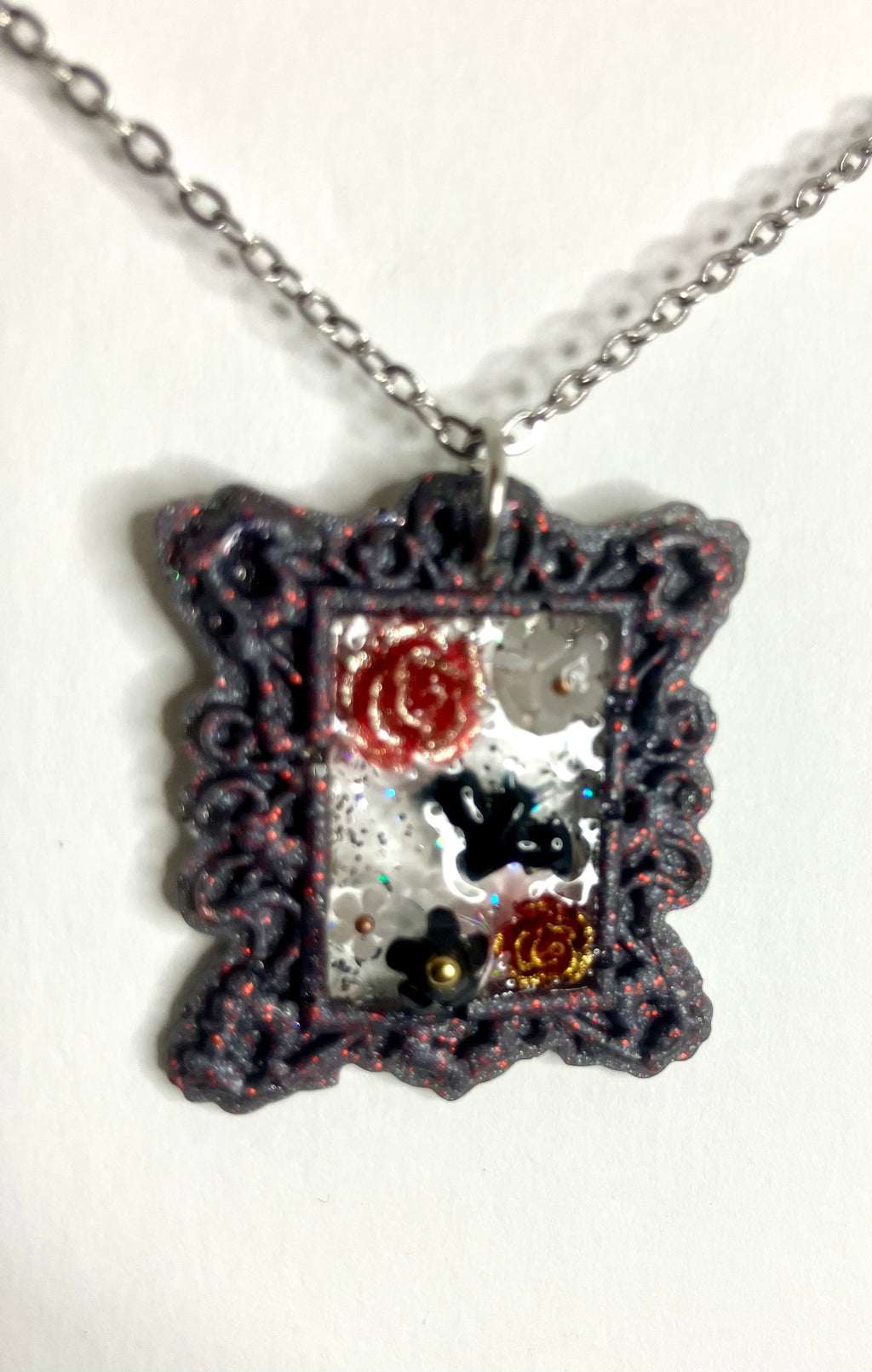 Resin frame pendants