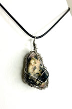 Wire wrapped stones and crystals with stainless steel wire