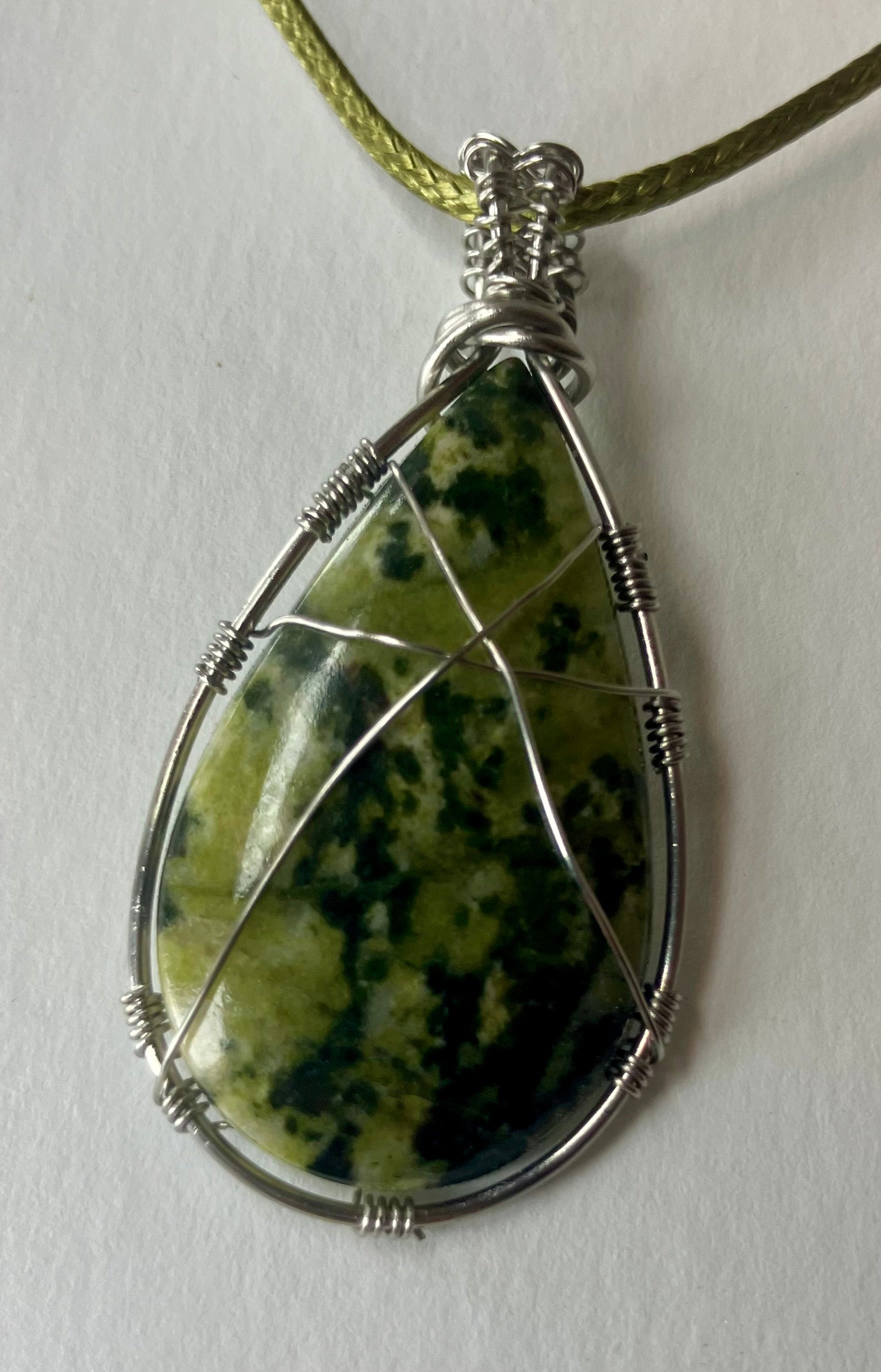 Wire wrapped stones and crystals with stainless steel wire