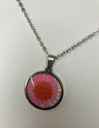 Dried flowers in resin jewelry