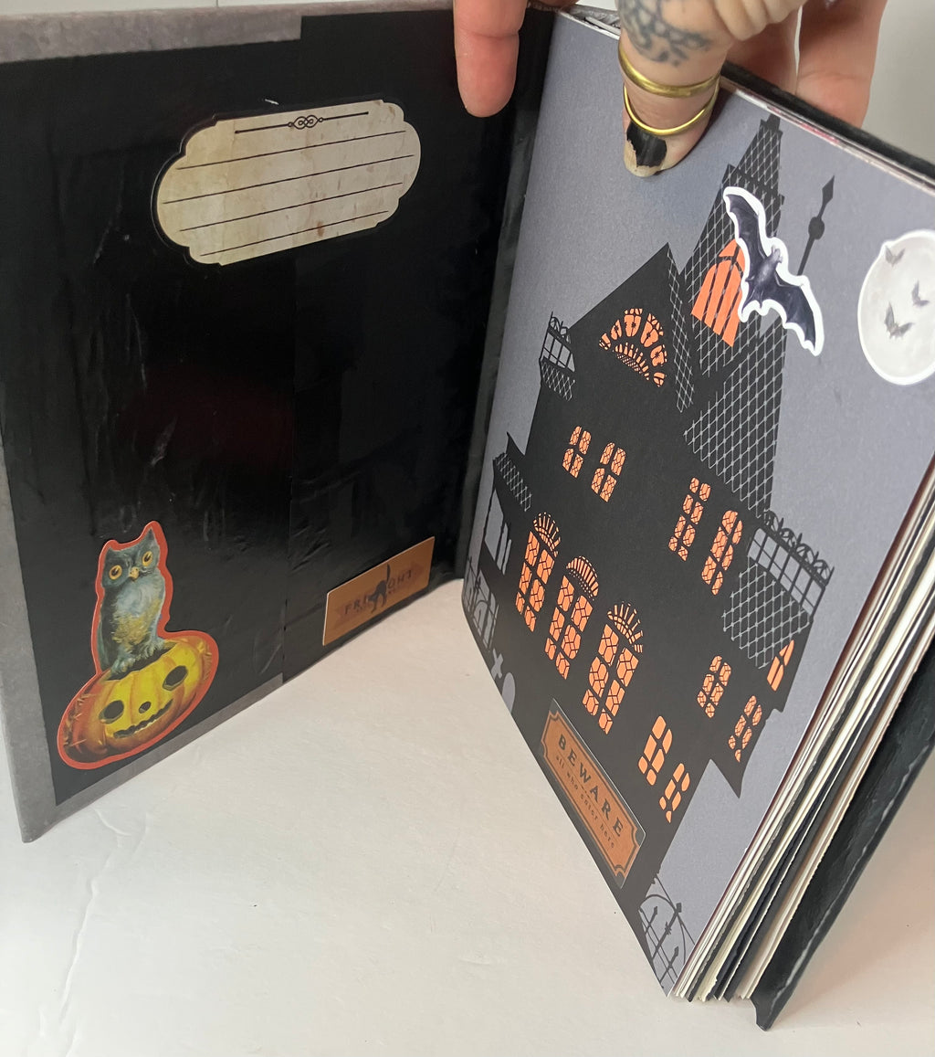 Haunted house themed junk journal