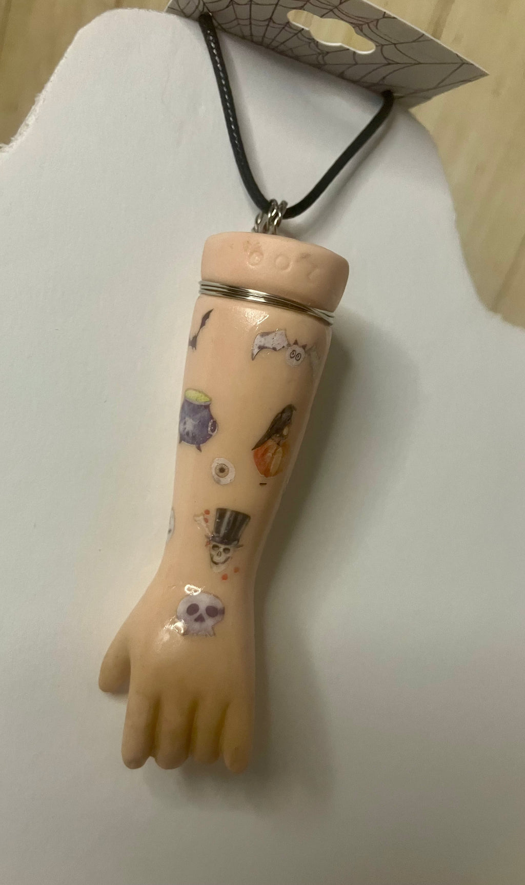 Baby arm necklaces