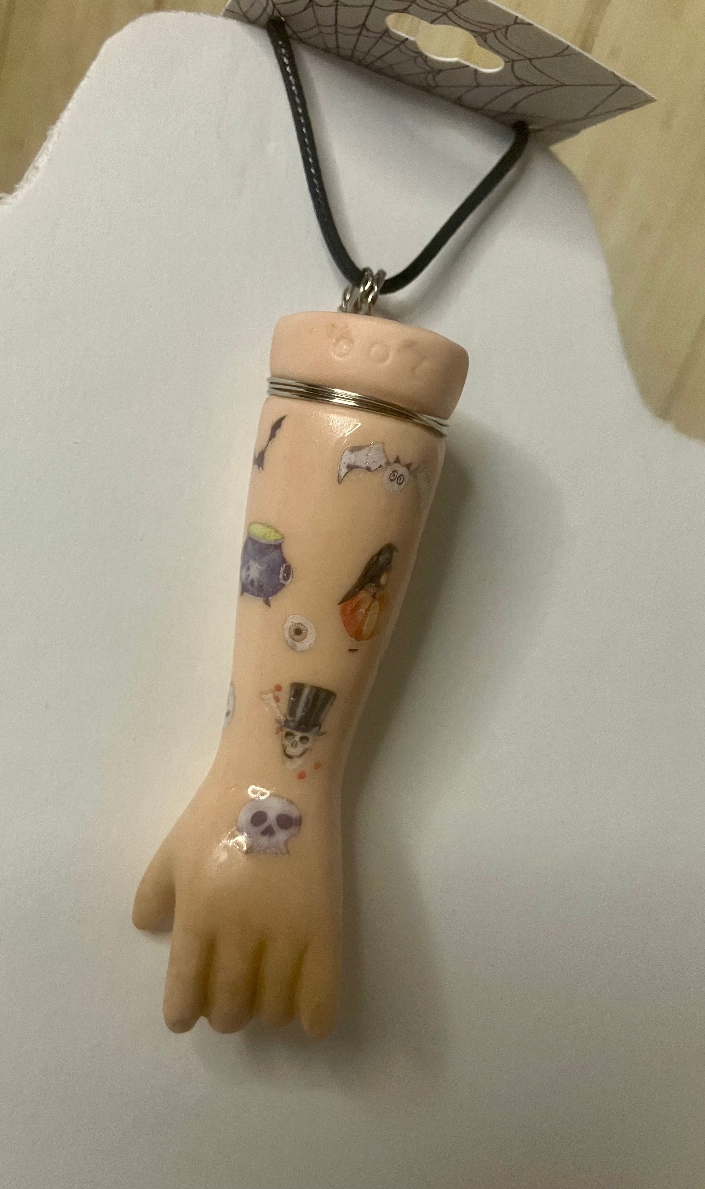 Baby arm necklaces