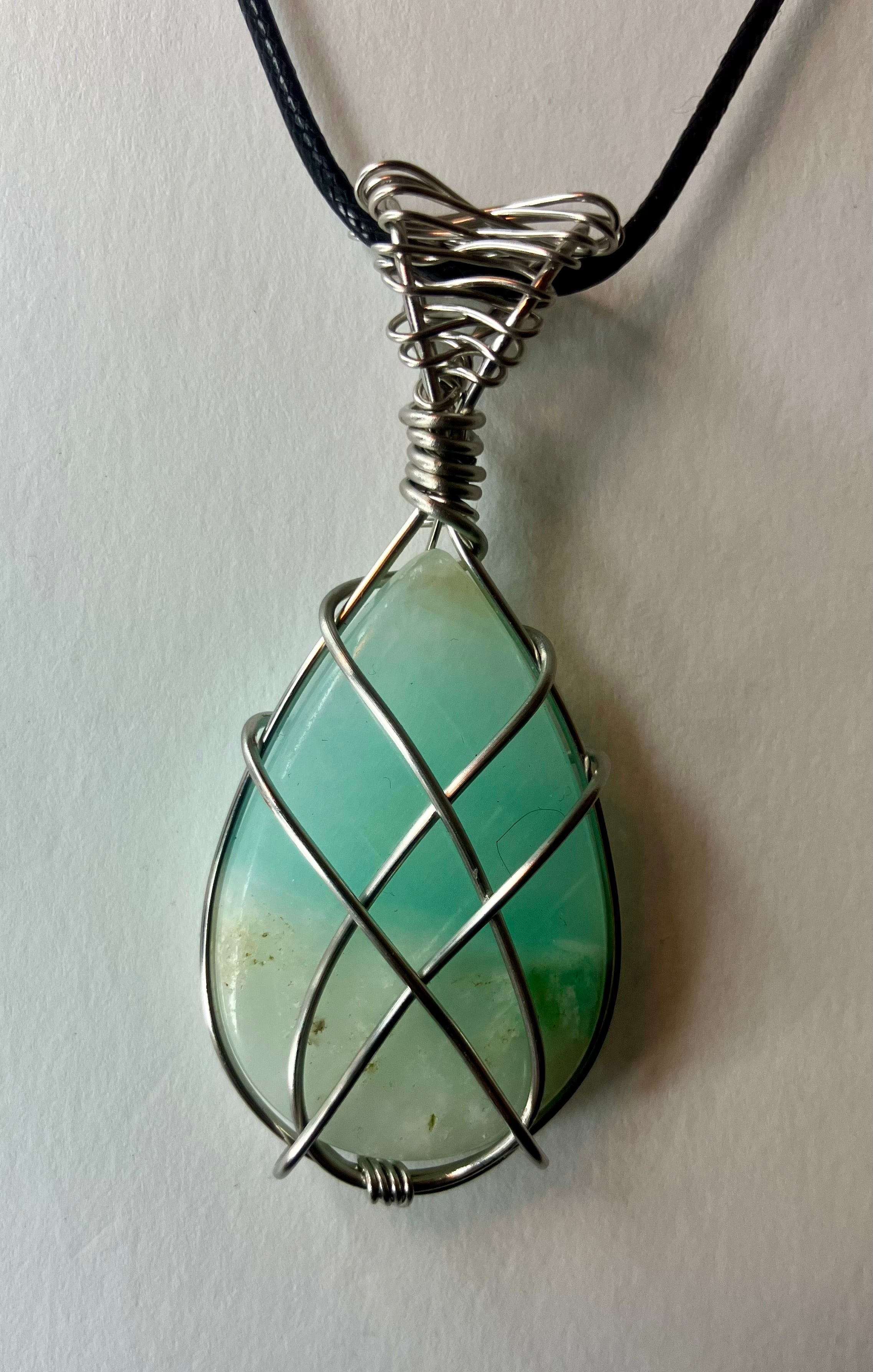 Wire wrapped stones and crystals with stainless steel wire