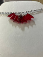 Bat necklaces