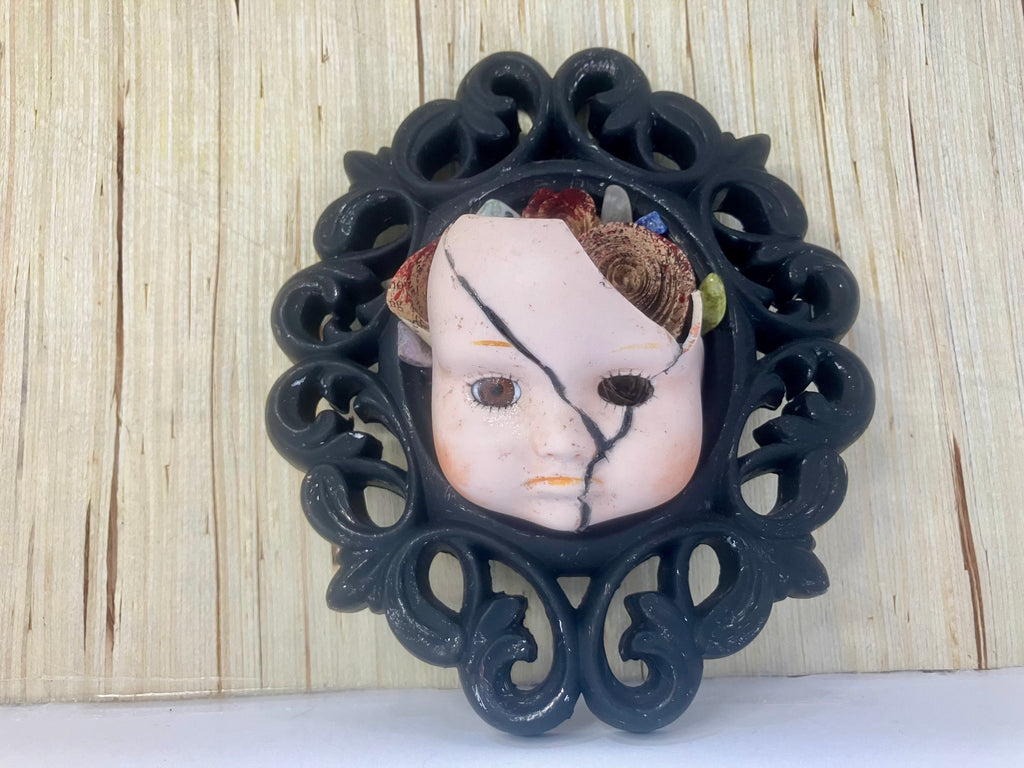 Pouty broken doll art