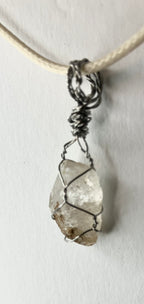 Wire wrapped stones and crystals with stainless steel wire