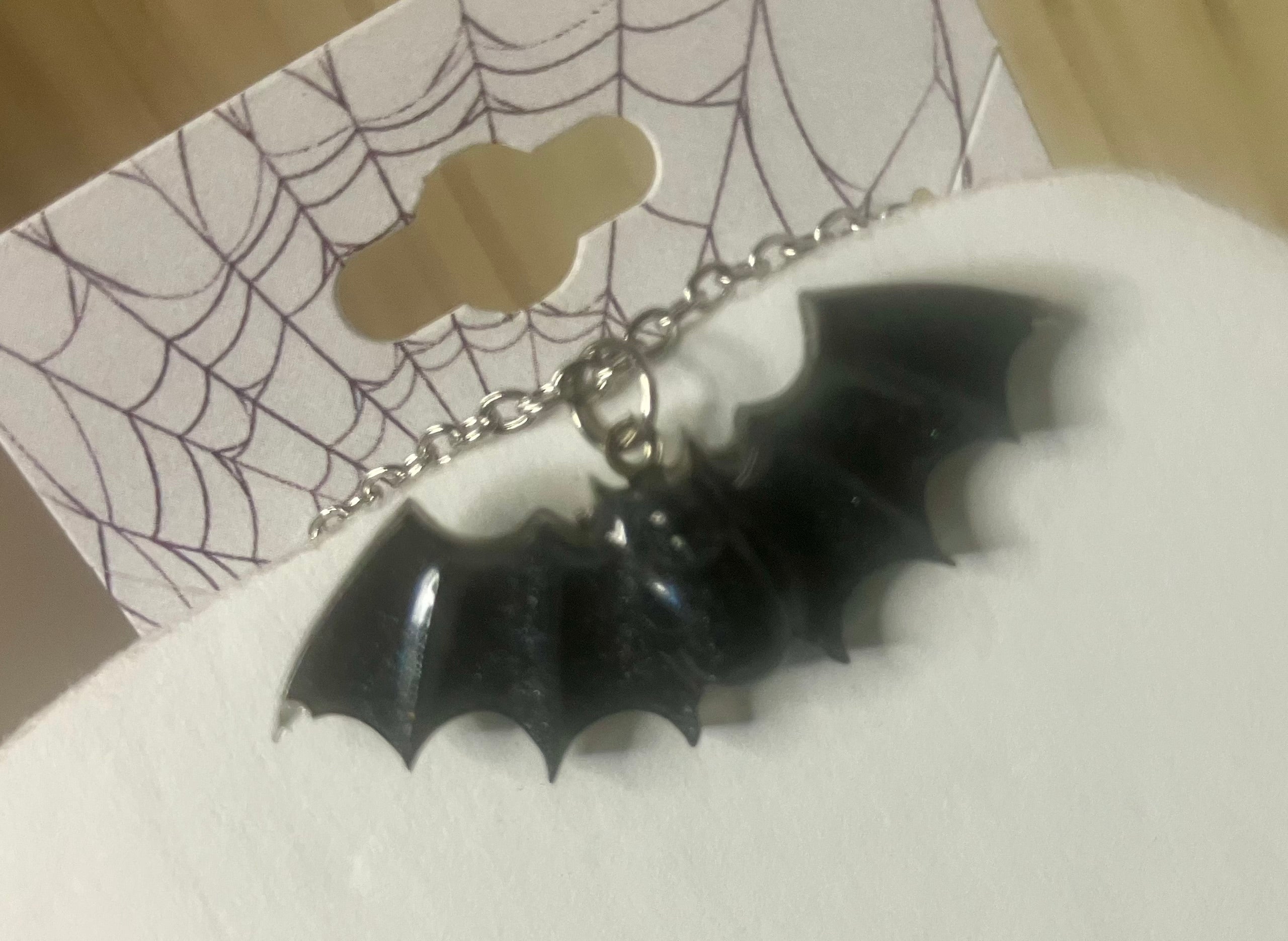 Bat necklaces