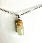 Glow in the dark vial jewelry