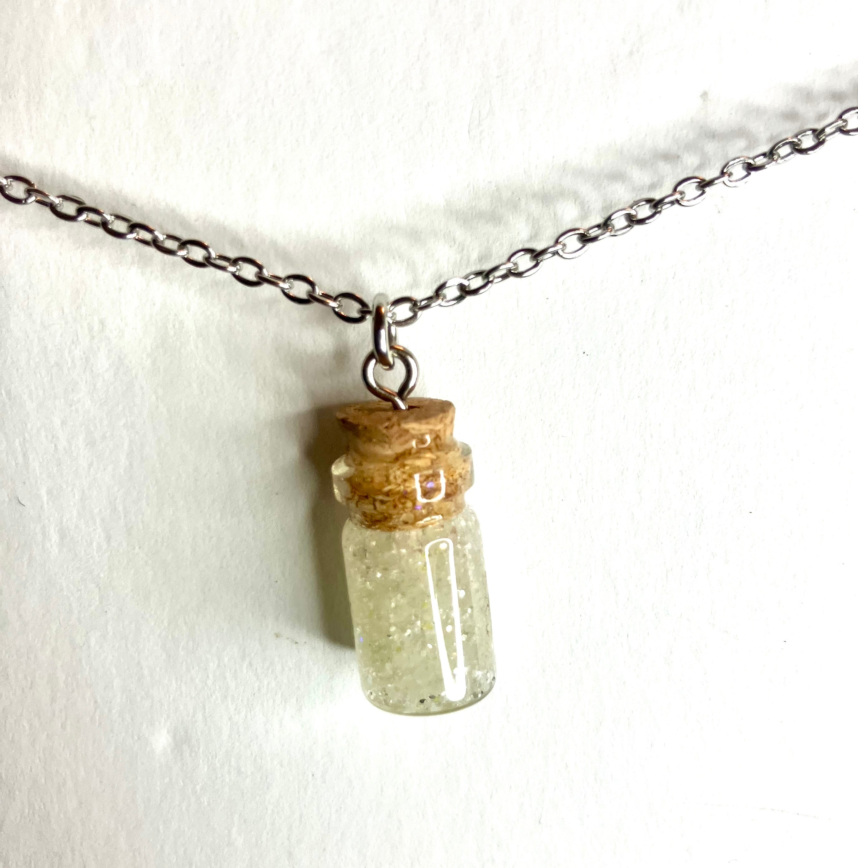 Glow in the dark vial jewelry