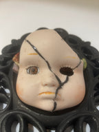 Pouty broken doll art
