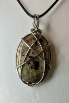 Wire wrapped stones and crystals with stainless steel wire