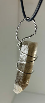 Wire wrapped stones and crystals with stainless steel wire
