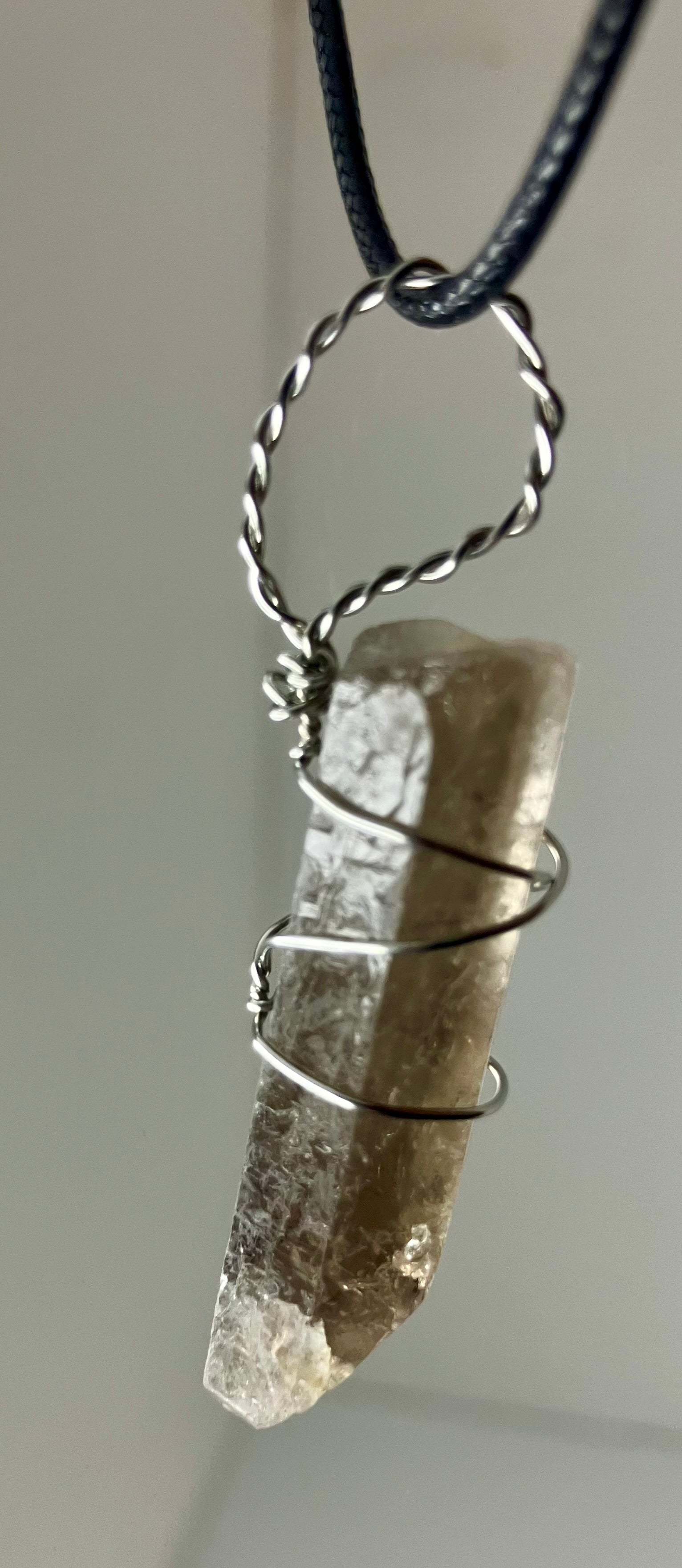 Wire wrapped stones and crystals with stainless steel wire