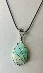 Wire wrapped stones and crystals with stainless steel wire