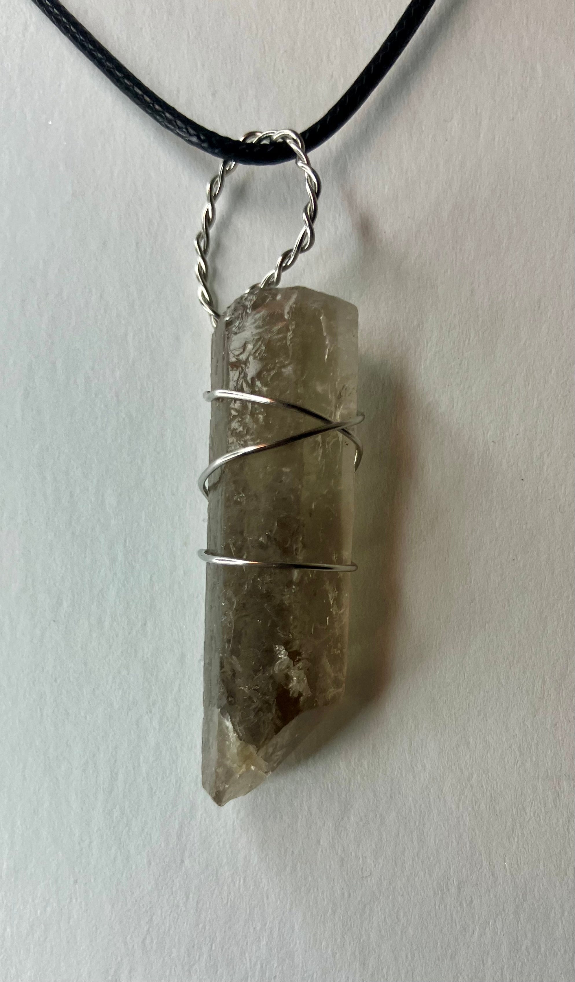 Wire wrapped stones and crystals with stainless steel wire