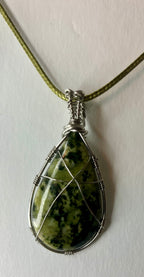 Wire wrapped stones and crystals with stainless steel wire