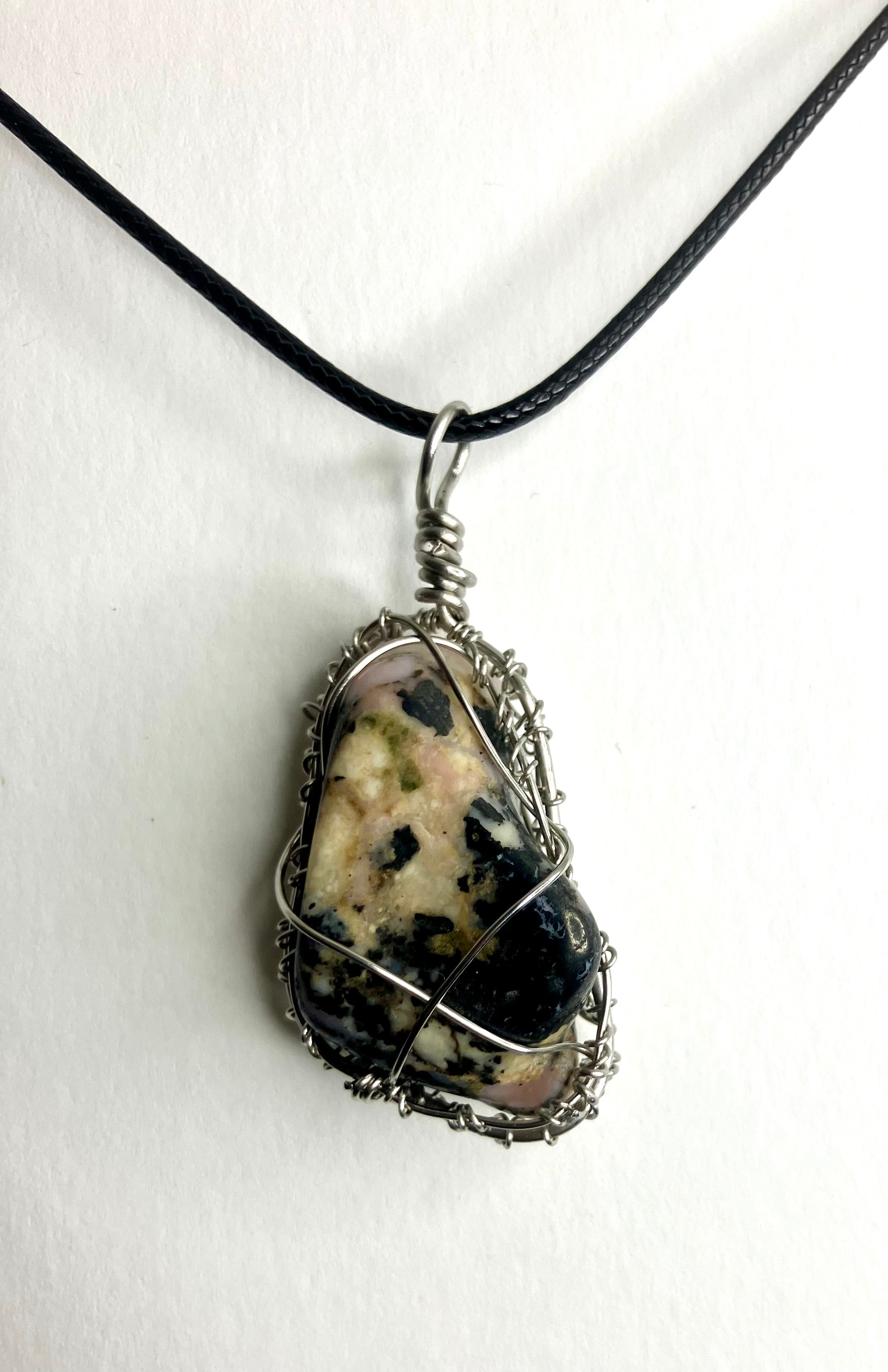 Wire wrapped stones and crystals with stainless steel wire