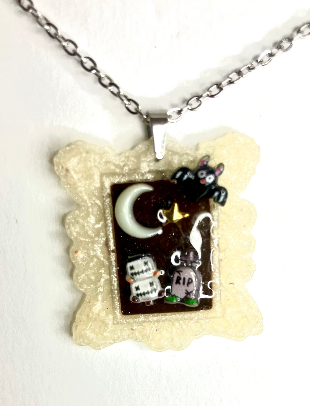 Resin frame pendants