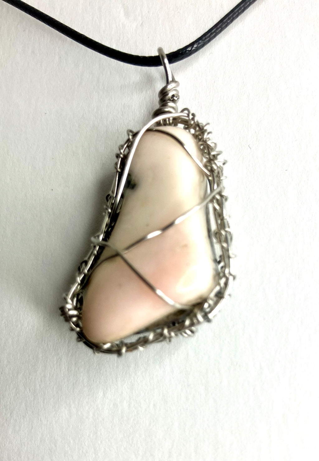 Wire wrapped stones and crystals with stainless steel wire