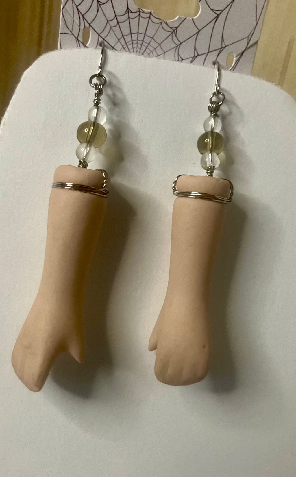 Baby arm necklaces