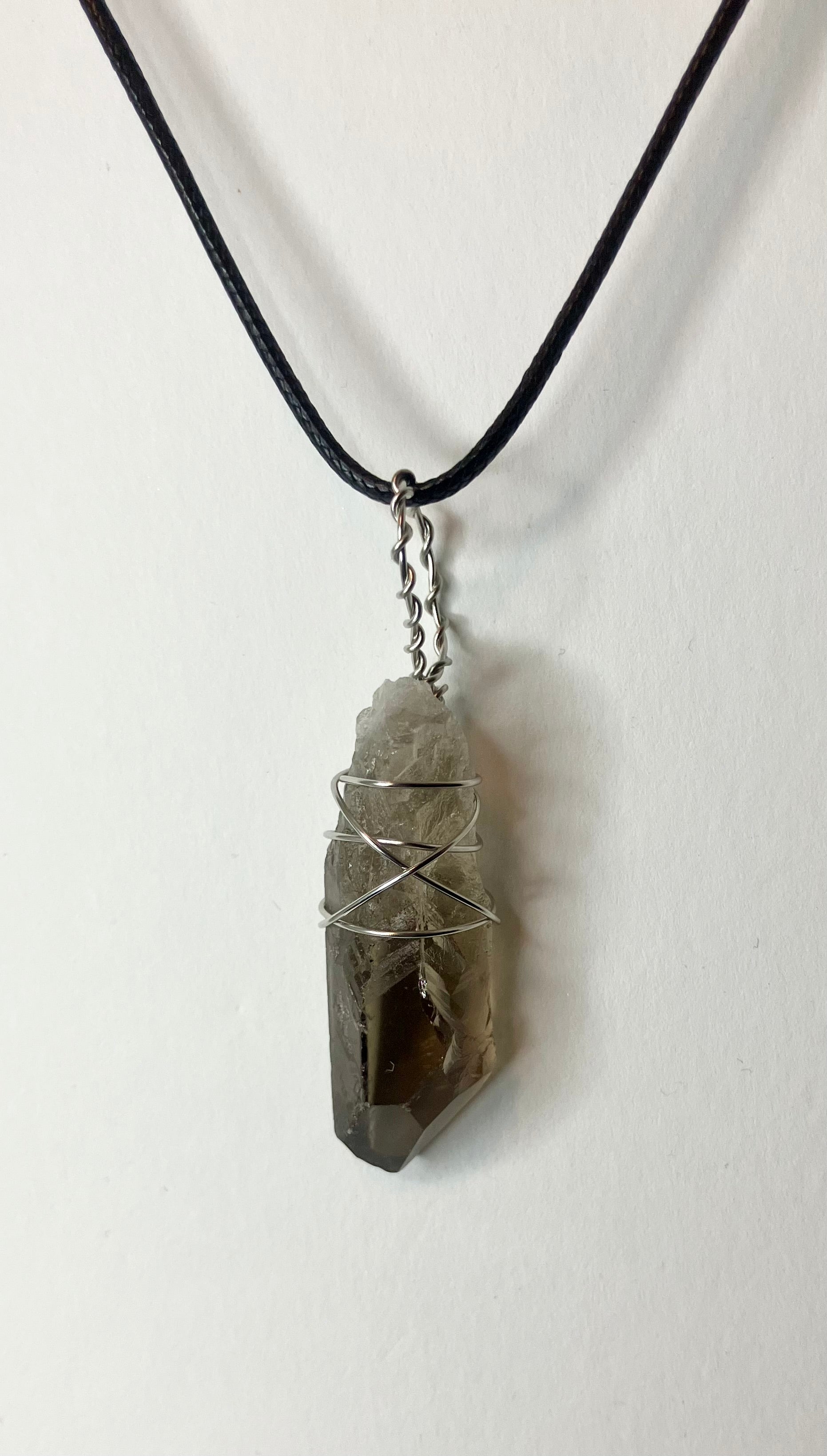 Wire wrapped stones and crystals with stainless steel wire