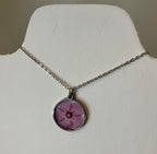 Dried flowers in resin jewelry