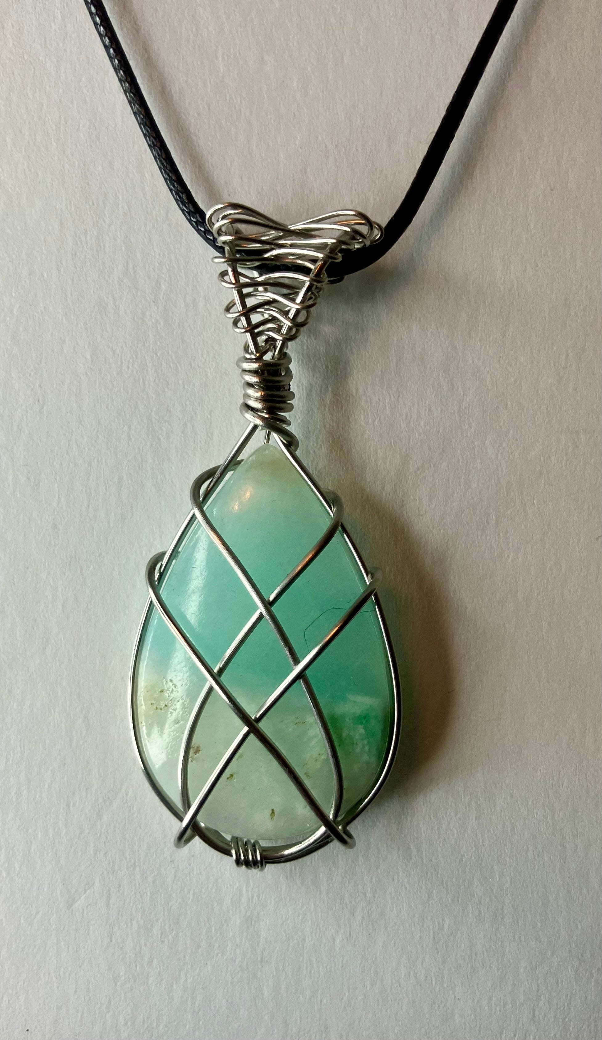 Wire wrapped stones and crystals with stainless steel wire